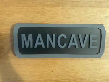 Mancave street sign